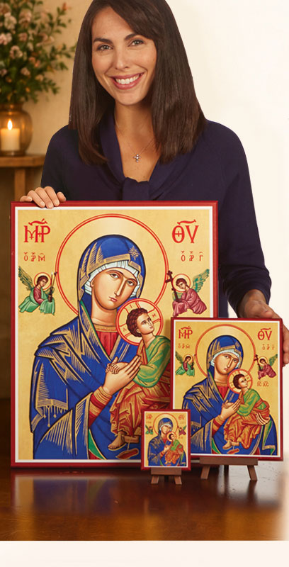 A woman holding sacred icons of the Theotokos